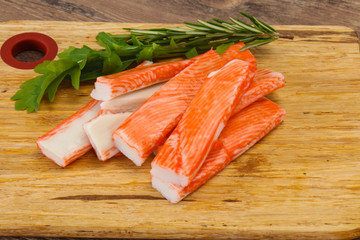 Crab stick surimi over board