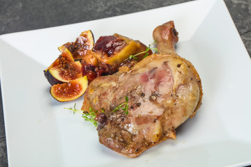 Roasted. duck. leg with plum and apple