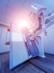 X-ray room in a hospital. Classic ceiling-mounted x-ray system.