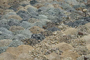 Stone dump texture. Multicolored stones background