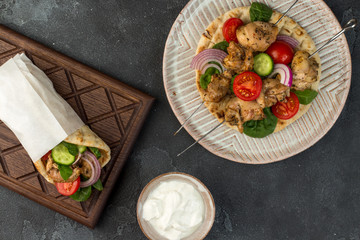Souvlaki with vegetables wrapped in pita