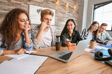 Group of students preparing for exam in university