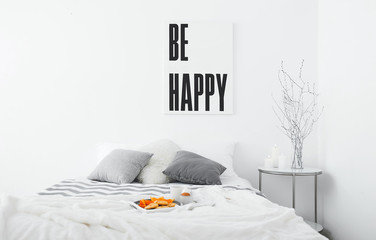 Interior of modern comfortable bedroom