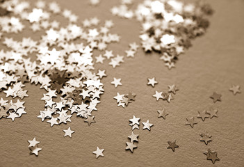 Monochrome image of glitter stars. Flat lay. Holiday concept. New year time