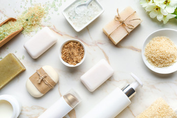 Composition with spa items and cosmetics on light background