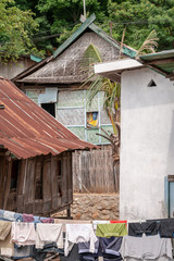 Laundry drying in the open air at Slums of Labuan Bajo, Flores, IDN