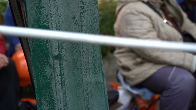Protesters hit metal sheets with batons on protest rallies. Slow motion. Video with sound