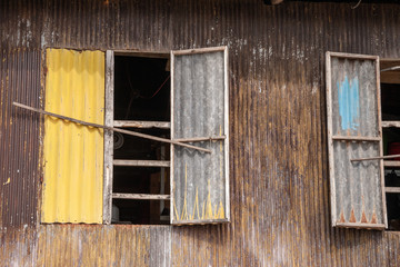 metal roof panels window at the slums of Labuan Bajo, Flores, IDN