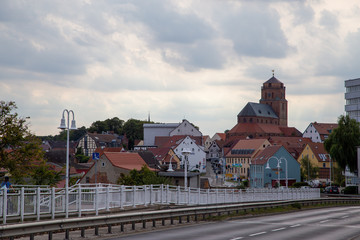 Fototapeta na wymiar The view from the bridge to the old town and the church of Wolgast