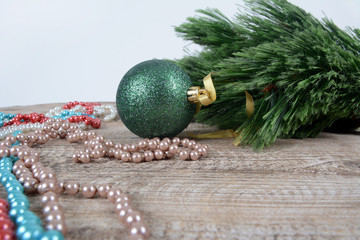 Christmas decorations beads and balls on table