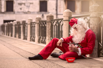 santa claus drinking a bottle of whiskey