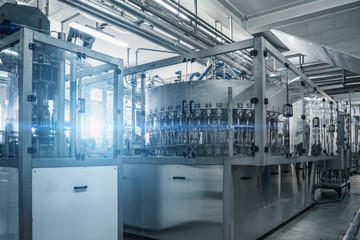 Industrial machine in beverage plant or factory interior, industry equipment