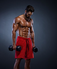 Fototapeta na wymiar Handsome Muscular Men, Bodybuilder Lifting Weights. copy space