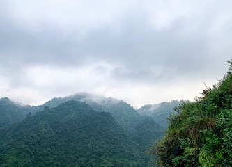 landscape with mountains and clouds