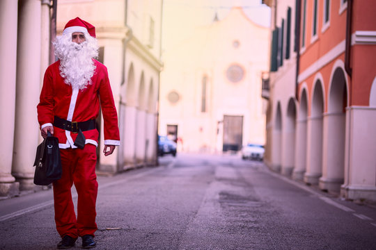 Santa Claus walks in the city.