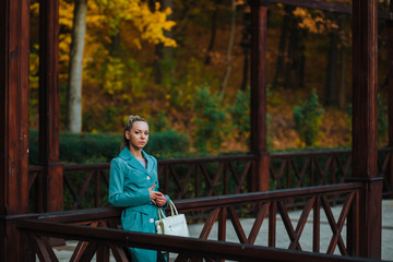 Fototapeta premium Portrait of a girl in the autumn Park
