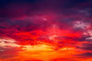 Fotobehang red sky with clouds © Zoran Jesic