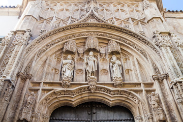 Fototapeta na wymiar Gothic portal of the forer Hospital of San Sebastian in Cordoba, Spain