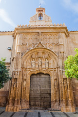 Fototapeta na wymiar Gothic portal of the forer Hospital of San Sebastian in Cordoba, Spain