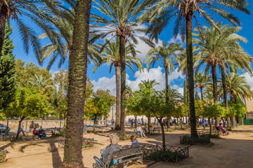 CORDOBA, SPAIN - NOVEMBER 5, 2017: Park in front of Alcazar in Cordoba.