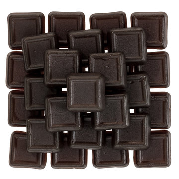 Dark Brown Salty Liquorice On A White Background