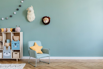 Interior design of scandinavian childroom with wooden cabinet, mint armchair, a lot of plush and...