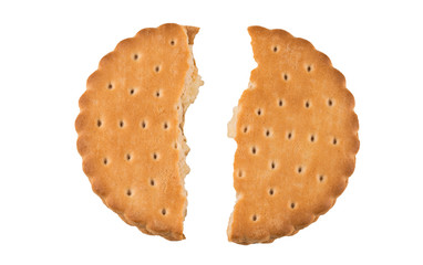 Tasty biscuit crushed into pieces close-up isolated on a white background