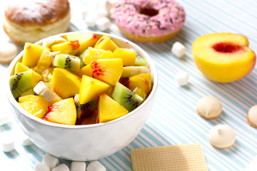 Fruit salad, donut and sweets