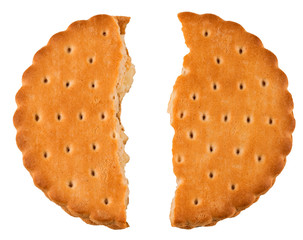 Tasty biscuit crushed into pieces close-up isolated on a white background