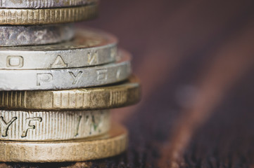 Old money and coins left in a column. Numismatics and collecting money. The Russian Empire and the world currency.Silver-gold. The toning, selective focus