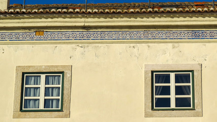 Closeup of a Typical facade of a building with tiles (azuleios)  wall  of Lisbon, Portugal
