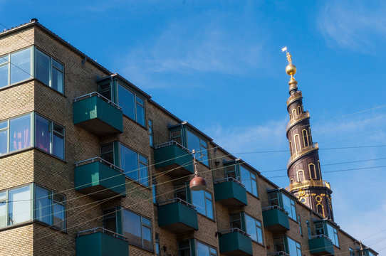Church of Our Saviour in Copenhagen, 	Denmark. The black and golden spire reaches a height of 90 metres and the external staircase turns four times counterclockwise around it