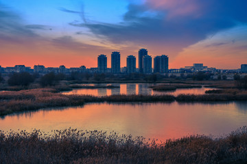 Spectacular sunset beautiful landscape cityscape horizon Bucharest Romania Delta Vacaresti 