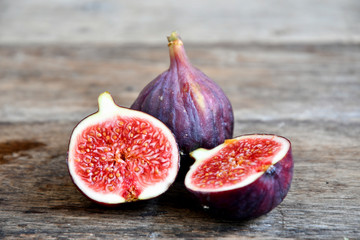 Ripe figs on old wooden boards.