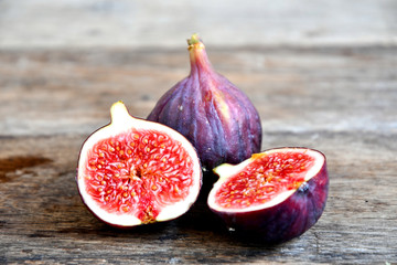 Ripe figs on old wooden boards.
