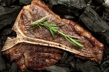 Grilled T-bone steak grilled with charcoal