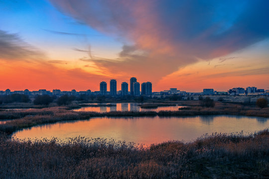 Spectacular sunset beautiful landscape cityscape horizon Bucharest Romania Delta Vacaresti 