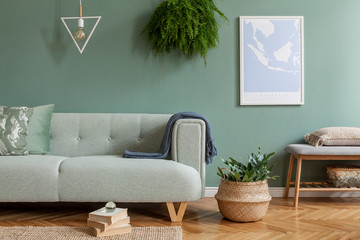 Stylish and scandinavian composition of living room interior with mint sofa, pillow, mock up poster...
