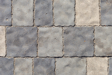 Paving from tiles. Graphic element on a stone. Construction product.