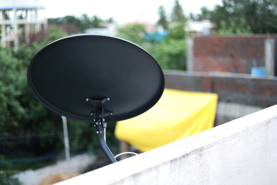 Installed Satellite dish or DTH or Direct to home tv on the roof.