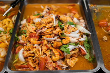 Asian street food at night food market.