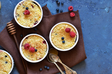 Crumble with berries, honey and almonds. View from above.