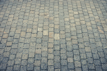 Old road paved with granite stones