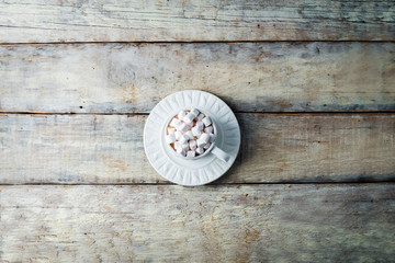 Christmas holidays wood background with Cup of Cocoa with marshmallow and Christmas decoration