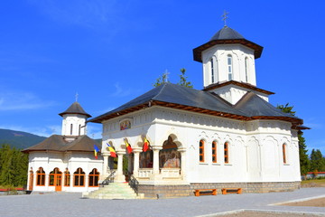 Fototapeta na wymiar Romanian Orthodox complex and monastery located on the Carpathian Mountains, at Izvorul Muresului, Harghita