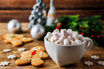 Christmas holidays wood background with Cup of Cocoa with marshmallow and Christmas decoration