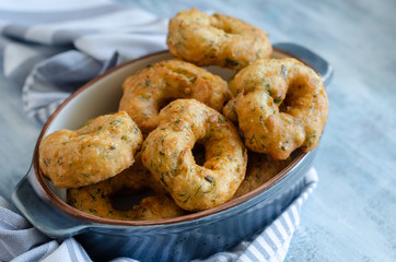 Traditional Turkish pastry : Pişi ; fried dough in oil with dill
