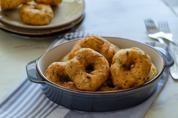 Traditional Turkish pastry : Pişi ; fried dough in oil with dill