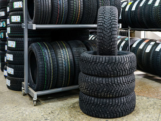 new winter tire set with studs at tire shop