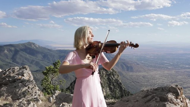 Violinist on Mountain